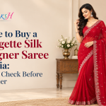 Georgette silk designer saree in a peach pink print for buying in India